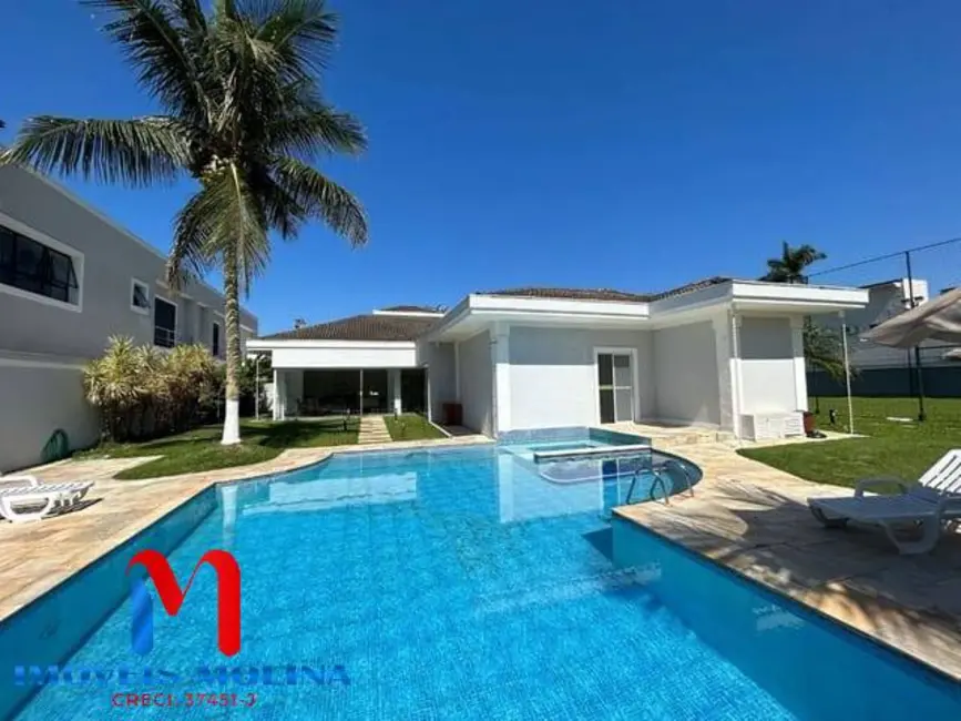 Casa com 7 quartos à venda e para alugar, 628m2 em Jardim Acapulco, Guaruja - SP - imagem 2 Foto 2 de Casa com 7 quartos à venda e para alugar, 628m2 em Jardim Acapulco, Guaruja - SP