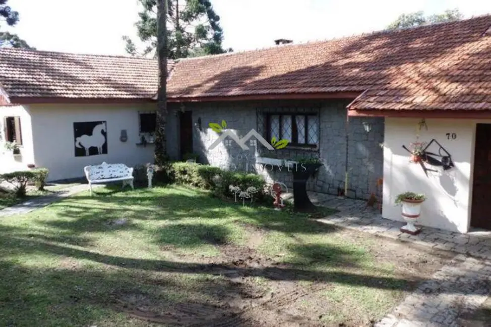 Foto 1 de Casa com 4 quartos à venda, 375m2 em Campos Do Jordao - SP