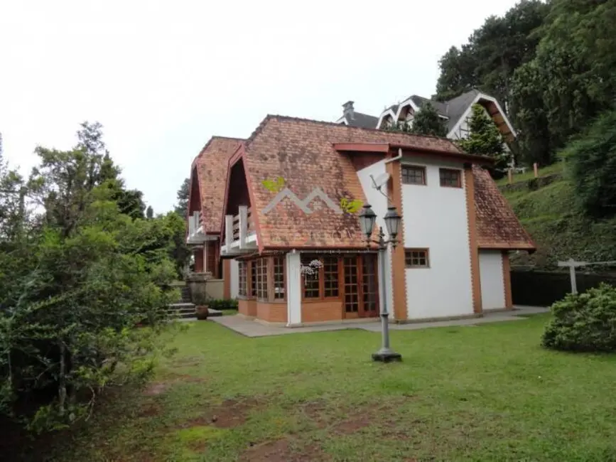 Foto 1 de Casa de Condomínio com 6 quartos à venda, 287m2 em Campos Do Jordao - SP