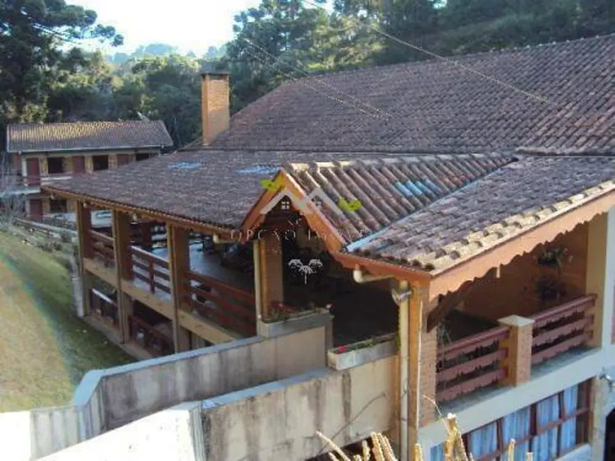 Foto 9 de Casa com 3 quartos à venda, 554m2 em Campos Do Jordao - SP