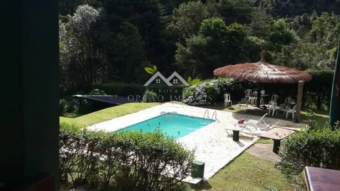 Foto 9 de Casa com 4 quartos à venda, 330m2 em Campos Do Jordao - SP
