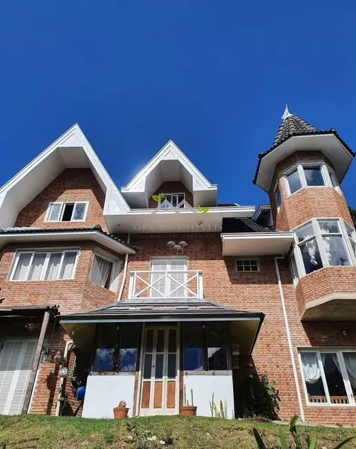 Foto 3 de Casa com 10 quartos à venda, 550m2 em Campos Do Jordao - SP