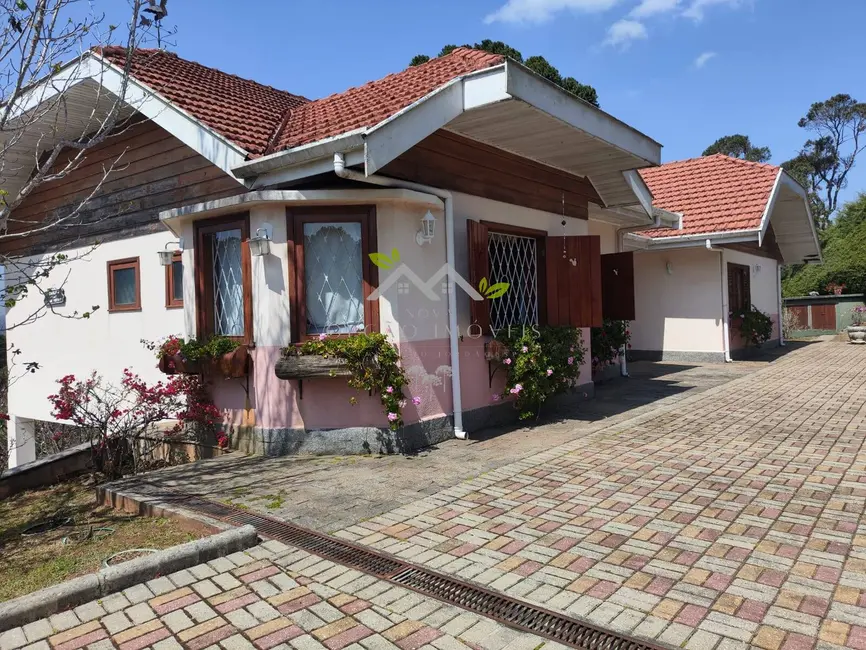 Foto 1 de Casa com 4 quartos à venda, 220m2 em Campos Do Jordao - SP