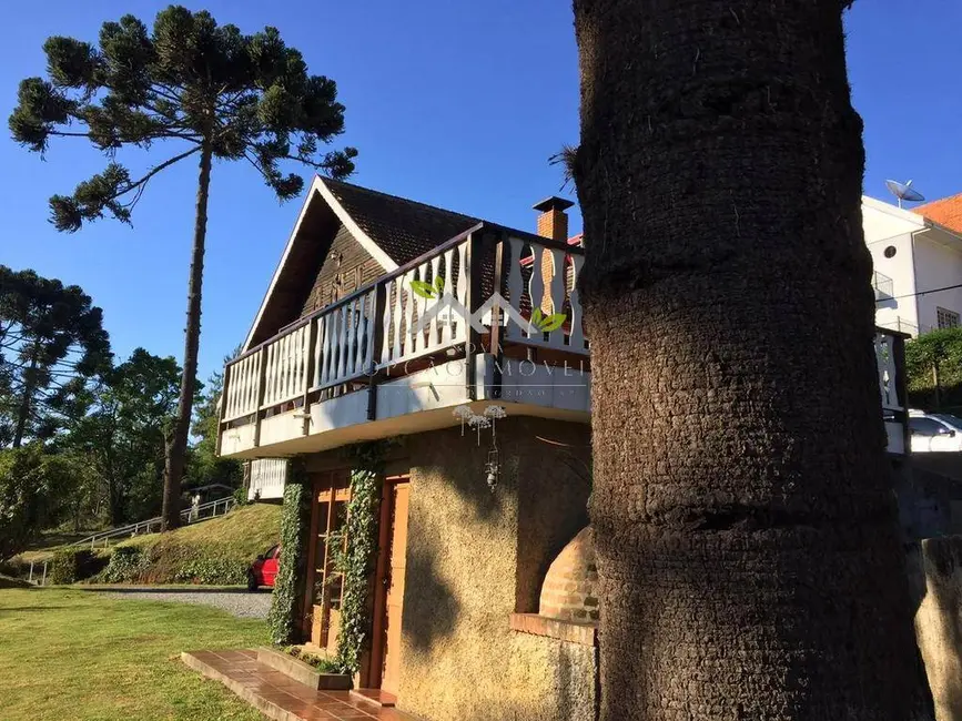 Foto 4 de Casa com 5 quartos à venda, 242m2 em Campos Do Jordao - SP
