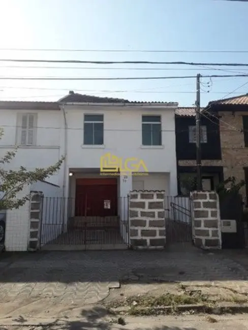 Casa com 5 quartos para alugar, 335m2 em Vila Mathias, Santos - SP - imagem 1 Foto 1 de Casa com 5 quartos para alugar, 335m2 em Vila Mathias, Santos - SP