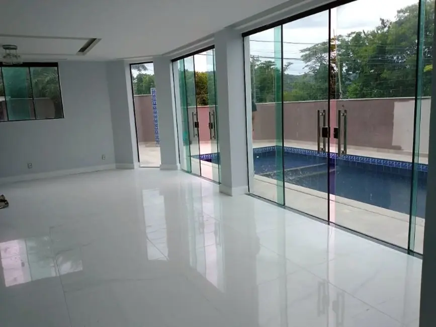 Casa com 4 quartos à venda, 353m2 em Camboinhas, Niteroi - RJ - imagem 6 Foto 6 de Casa com 4 quartos à venda, 353m2 em Camboinhas, Niteroi - RJ