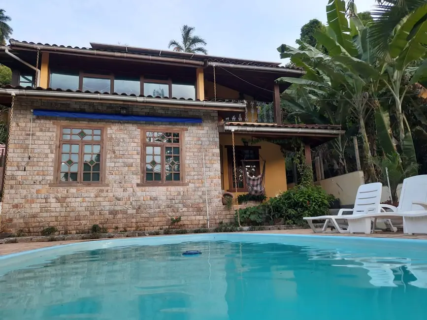 Foto 1 de Casa de Condomínio com 3 quartos à venda em Ilhabela - SP
