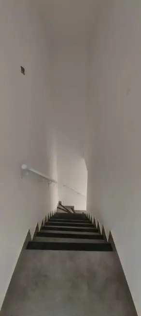 Foto 2 de Sobrado com 3 quartos à venda, 77m2 em Maracanã, Praia Grande - SP