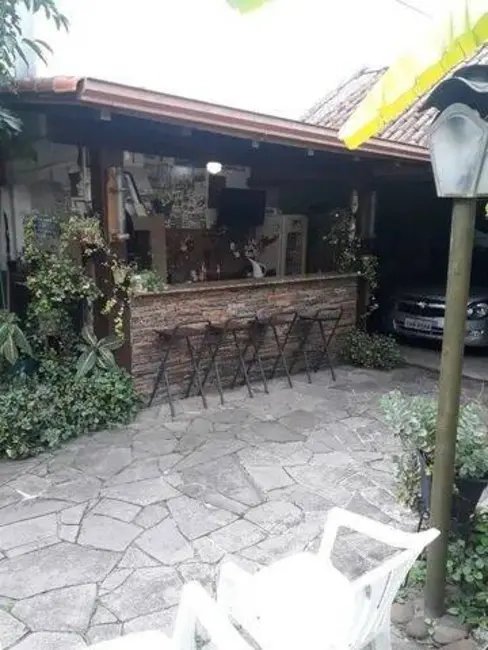 Casa com 3 quartos à venda, 230m2 em Higienópolis, Porto Alegre - RS - imagem 5 Foto 5 de Casa com 3 quartos à venda, 230m2 em Higienópolis, Porto Alegre - RS