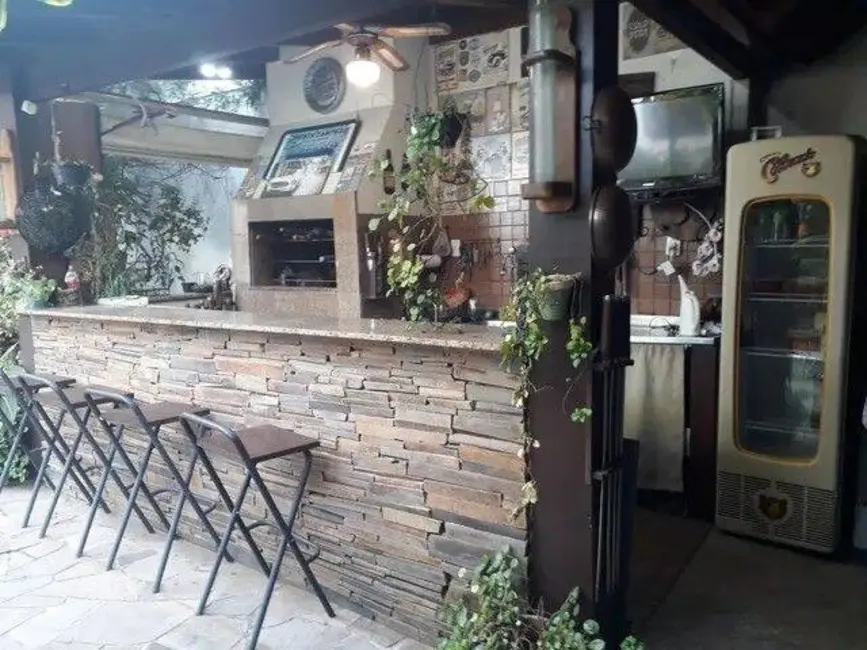 Casa com 3 quartos à venda, 230m2 em Higienópolis, Porto Alegre - RS - imagem 4 Foto 4 de Casa com 3 quartos à venda, 230m2 em Higienópolis, Porto Alegre - RS