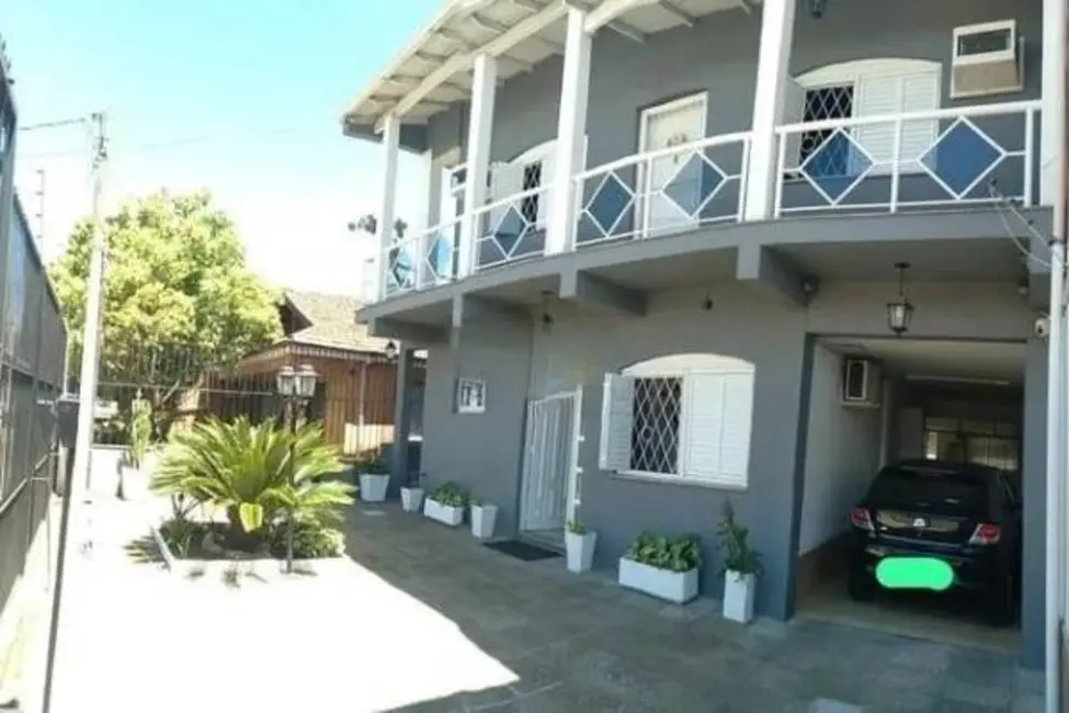 Foto 1 de Casa com 6 quartos à venda, 570m2 em Sarandi, Porto Alegre - RS