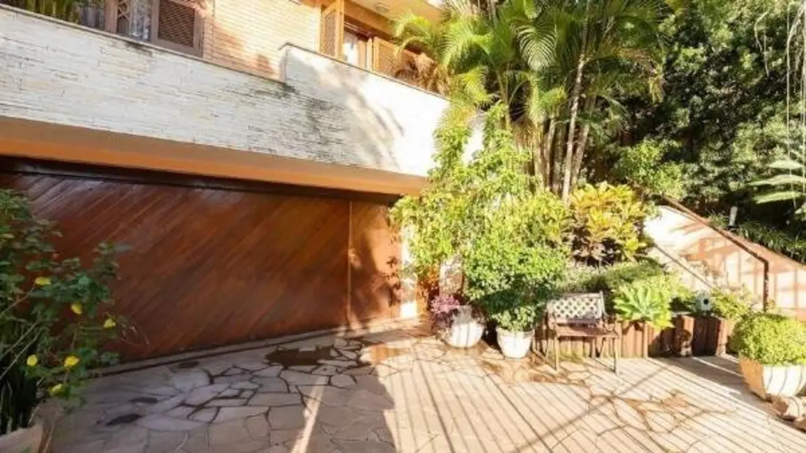 Foto 1 de Casa com 4 quartos à venda, 233m2 em Chácara das Pedras, Porto Alegre - RS