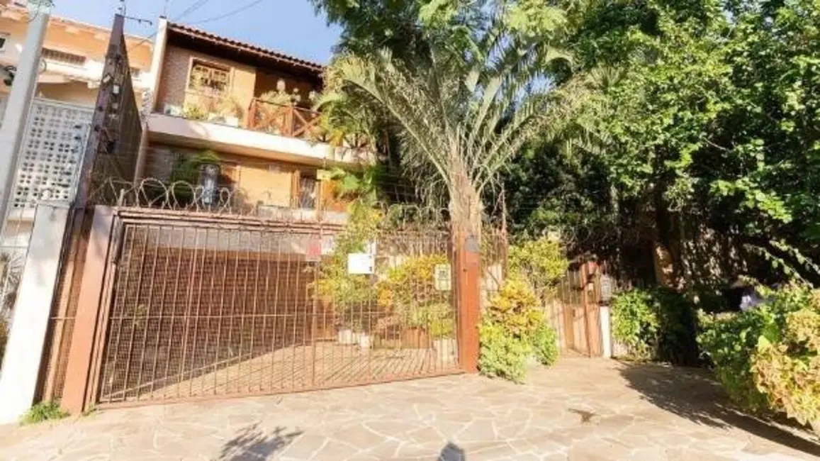 Foto 2 de Casa com 4 quartos à venda, 233m2 em Chácara das Pedras, Porto Alegre - RS