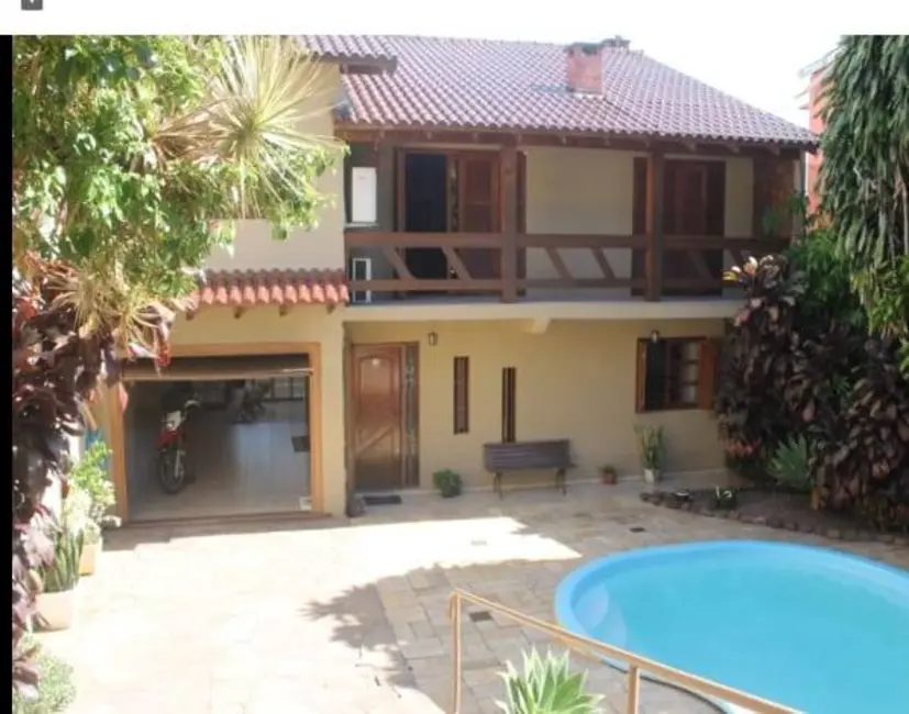 Foto 1 de Casa com 3 quartos à venda, 263m2 em Parque Santa Fé, Porto Alegre - RS