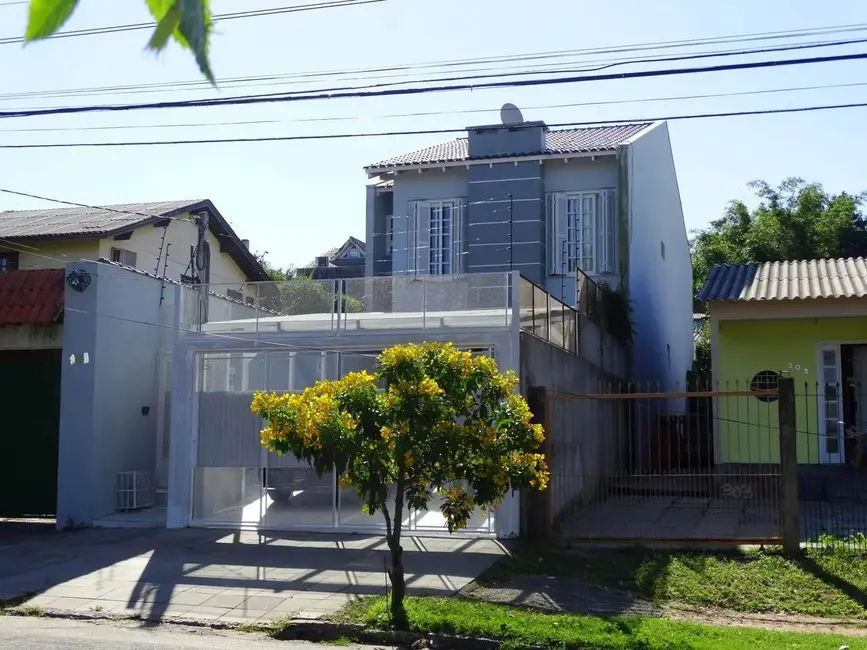 Foto 2 de Casa com 5 quartos à venda, 244m2 em Santa Tereza, Porto Alegre - RS