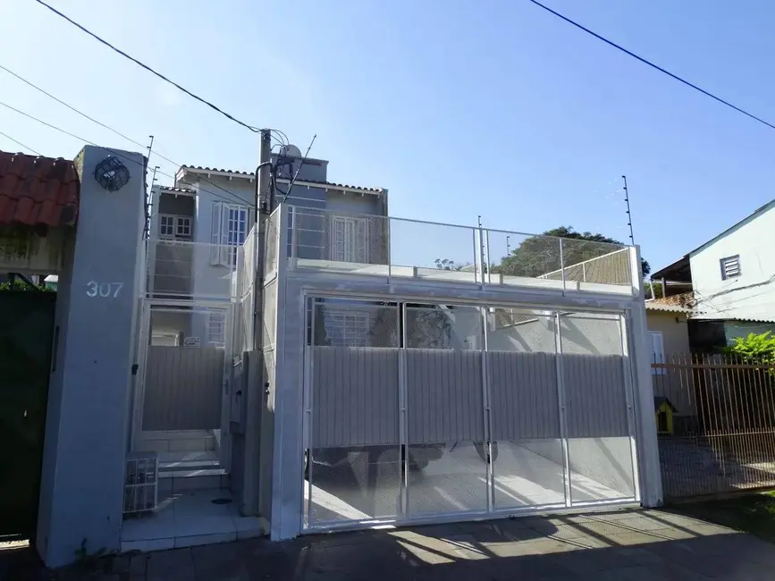 Foto 1 de Casa com 5 quartos à venda, 244m2 em Santa Tereza, Porto Alegre - RS
