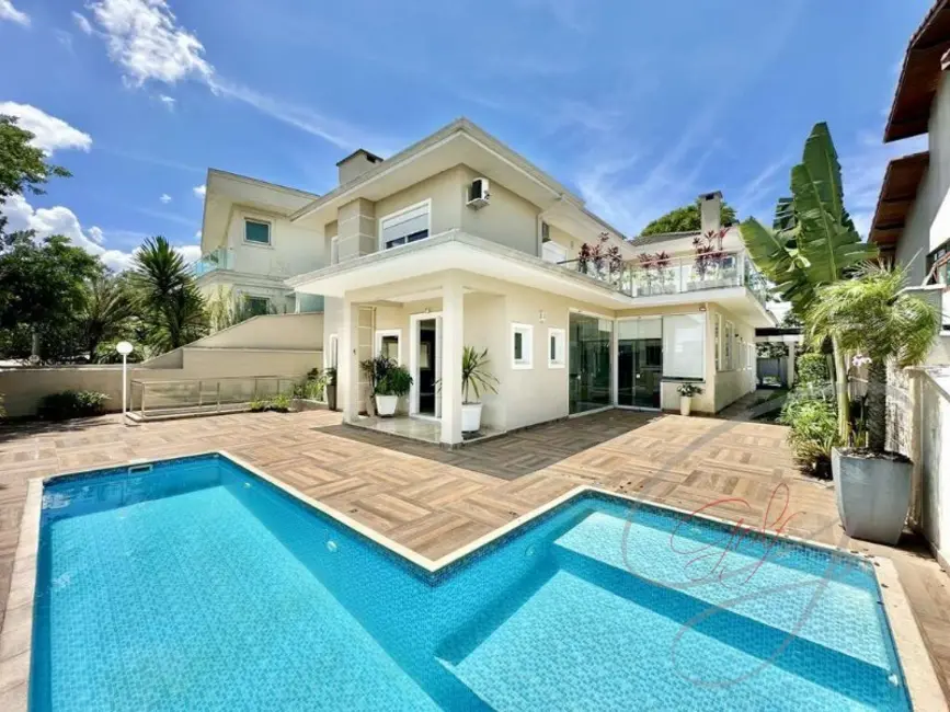 Foto 1 de Casa de Condomínio com 4 quartos à venda e para alugar, 359m2 em Granja Viana, Carapicuiba - SP