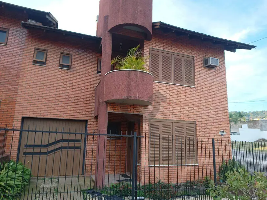 Foto 1 de Casa com 3 quartos à venda, 138m2 em Santa Cruz Do Sul - RS