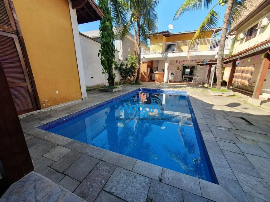 Foto 1 de Casa de Condomínio com 9 quartos à venda, 650m2 em Jardim Três Marias, Guaruja - SP