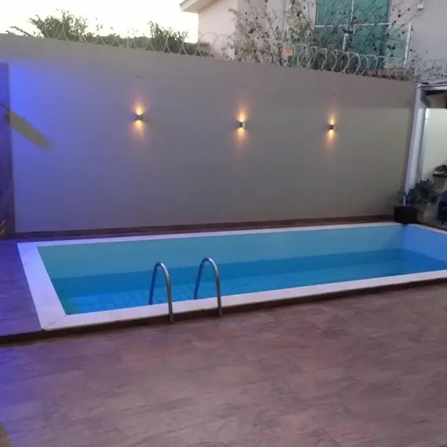 Foto 5 de Casa com 3 quartos à venda, 250m2 em Barcelona Park, Montes Claros - MG