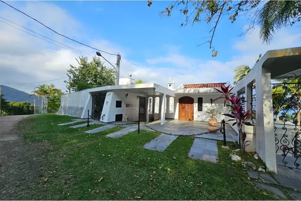 Foto 1 de Casa de Condomínio com 4 quartos à venda, 427m2 em Loteamento Roteiro do Sol, Caraguatatuba - SP