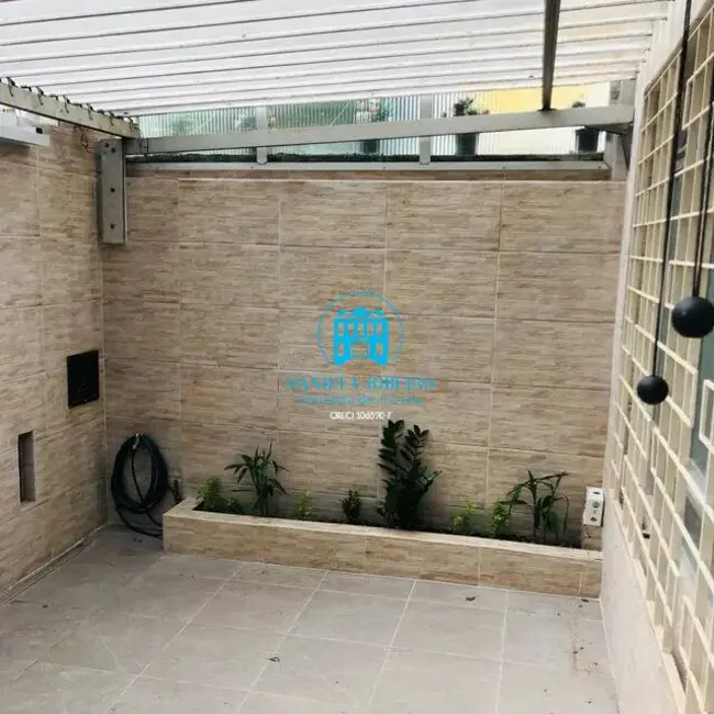 Foto 2 de Casa com 3 quartos à venda, 110m2 em Encruzilhada, Santos - SP