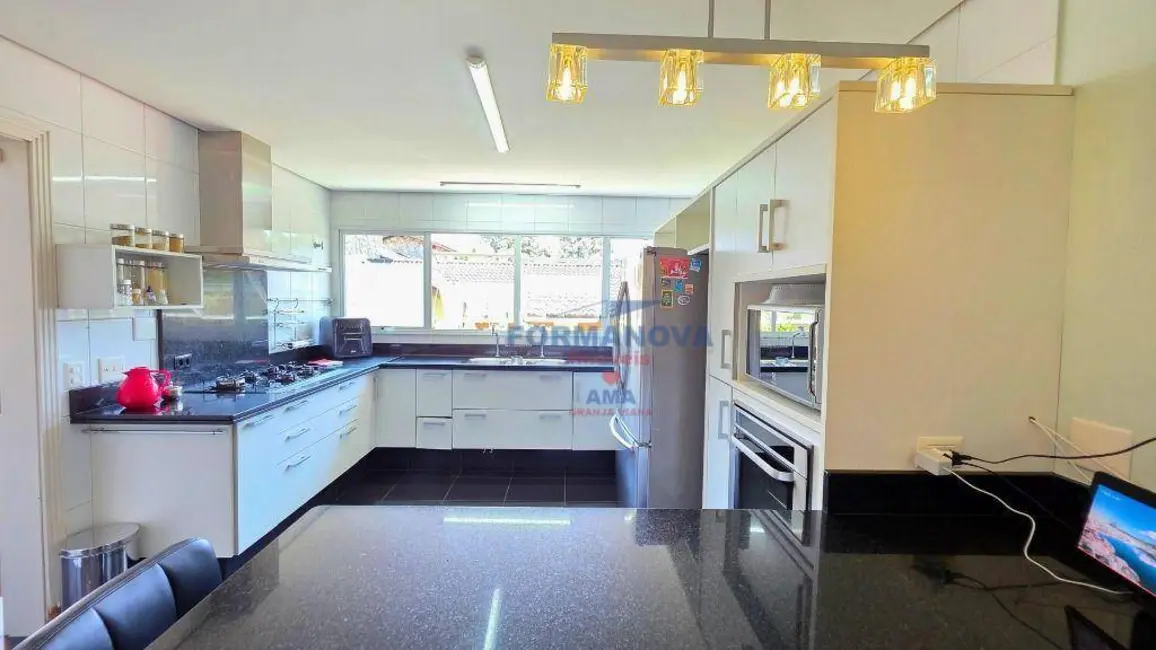 Foto 6 de Casa de Condomínio com 5 quartos à venda e para alugar, 915m2 em São Paulo II, Cotia - SP