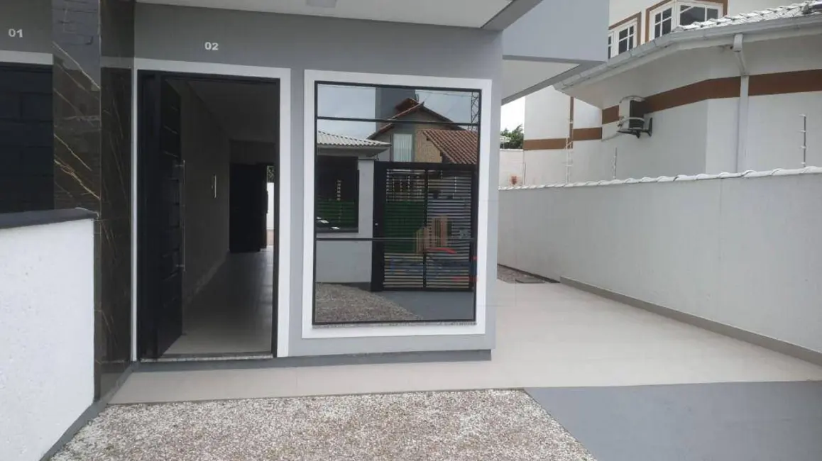 Foto 2 de Sobrado com 3 quartos à venda, 180m2 em Caminho Novo, Palhoca - SC
