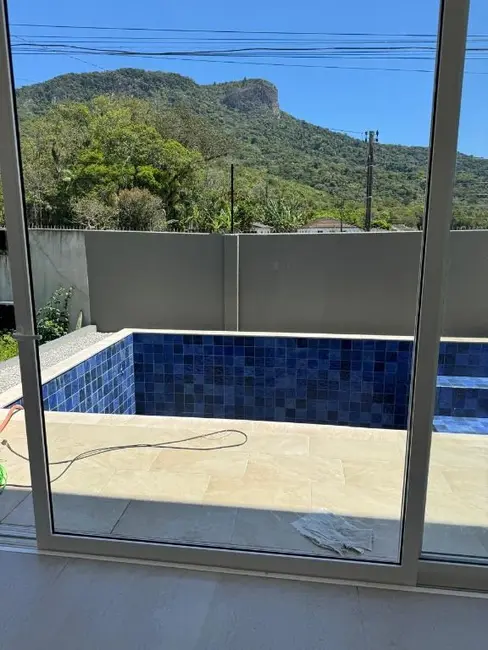Casa de Condomínio com 4 quartos à venda, 320m2 em Palhoca - SC - imagem 4 Foto 4 de Casa de Condomínio com 4 quartos à venda, 320m2 em Palhoca - SC