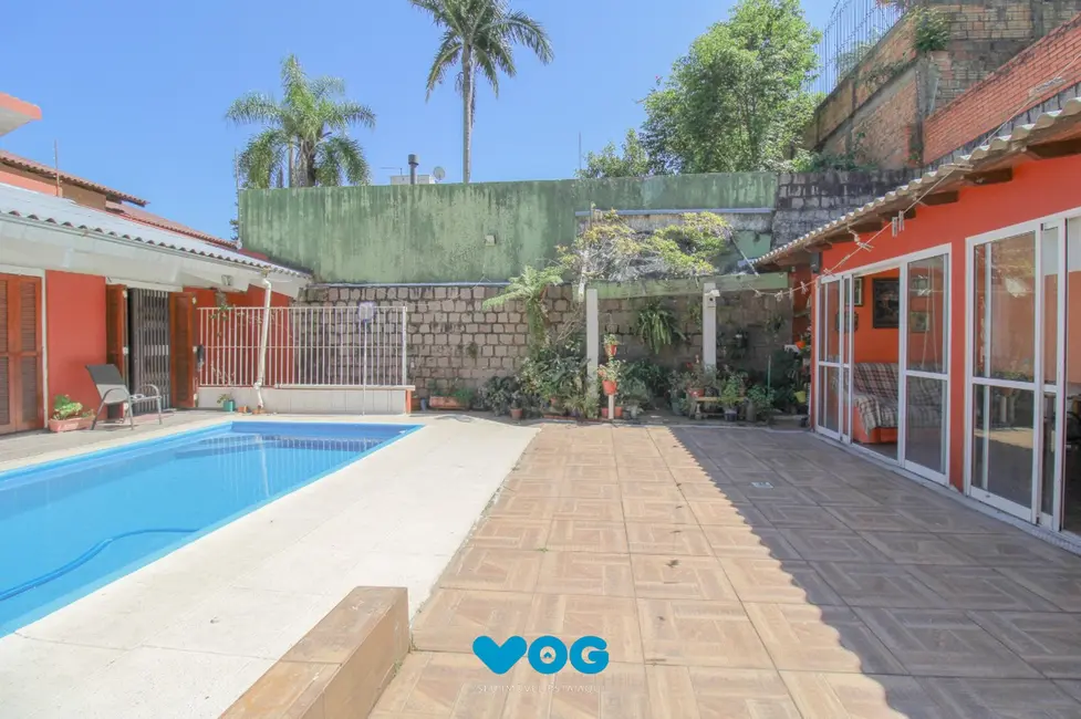 Foto 3 de Casa com 3 quartos à venda, 344m2 em Chácara das Pedras, Porto Alegre - RS