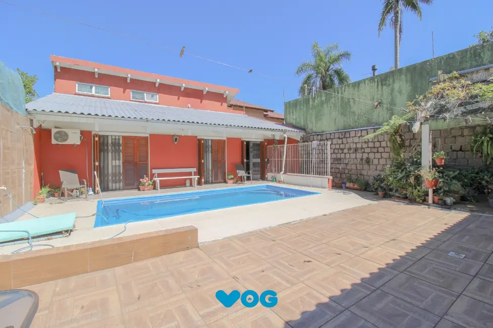 Foto 1 de Casa com 3 quartos à venda, 344m2 em Chácara das Pedras, Porto Alegre - RS