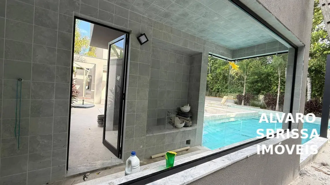 Foto 5 de Casa com 7 quartos à venda, 788m2 em Riviera de São Lourenço, Bertioga - SP