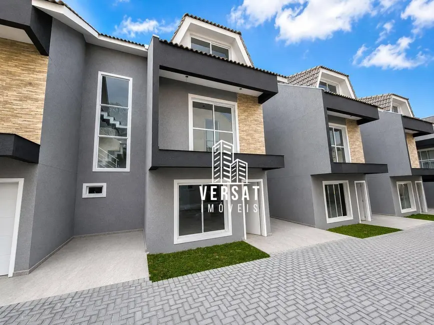 Sobrado com 3 quartos à venda, 131m2 em Uberaba, Curitiba - PR - imagem 1 Foto 1 de Sobrado com 3 quartos à venda, 131m2 em Uberaba, Curitiba - PR