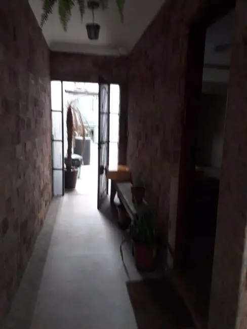 Foto 1 de Casa com 4 quartos à venda, 125m2 em Boqueirão, Praia Grande - SP