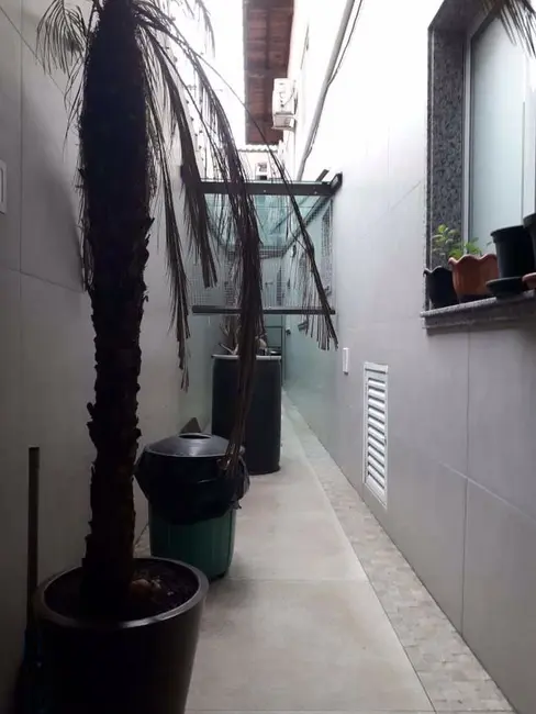 Foto 3 de Casa com 4 quartos à venda, 125m2 em Boqueirão, Praia Grande - SP