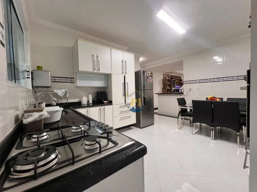 Foto 4 de Sobrado com 3 quartos à venda, 121m2 em Praia Grande - SP