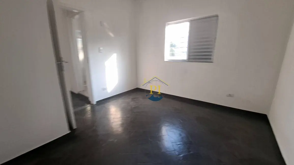 Foto 2 de Sobrado com 3 quartos à venda, 140m2 em Aviação, Praia Grande - SP