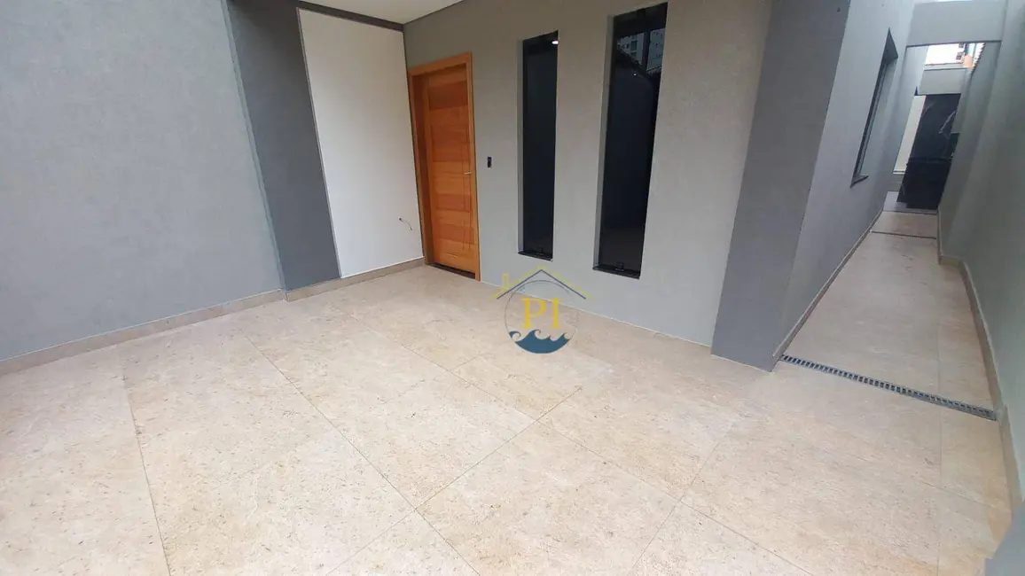 Foto 1 de Sobrado com 3 quartos à venda, 160m2 em Aviação, Praia Grande - SP