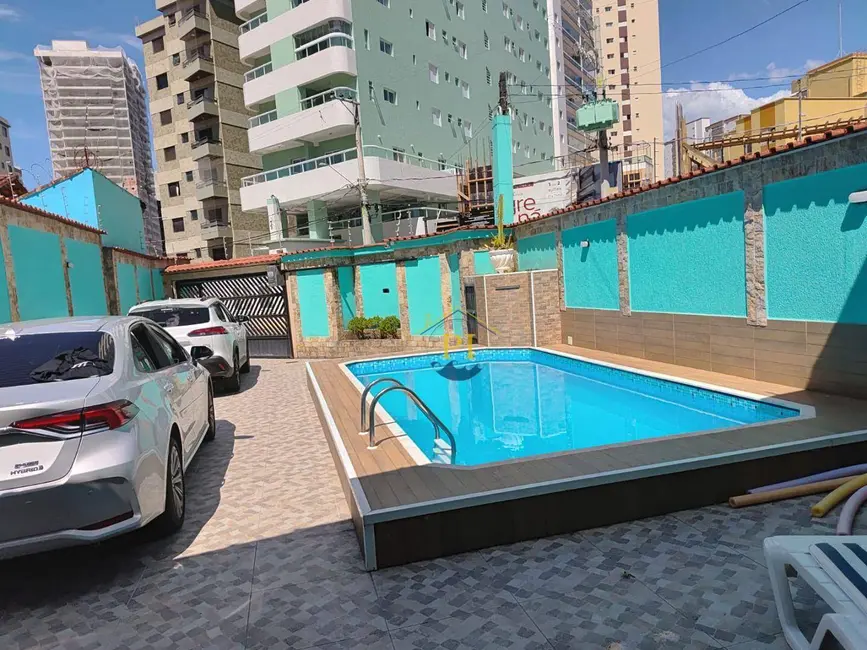 Casa com 3 quartos à venda em Praia Grande - SP - imagem 1 Foto 1 de Casa com 3 quartos à venda em Praia Grande - SP