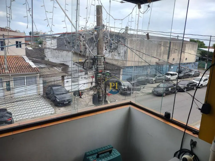 Foto 2 de Sobrado com 3 quartos à venda, 235m2 em Praia Grande - SP