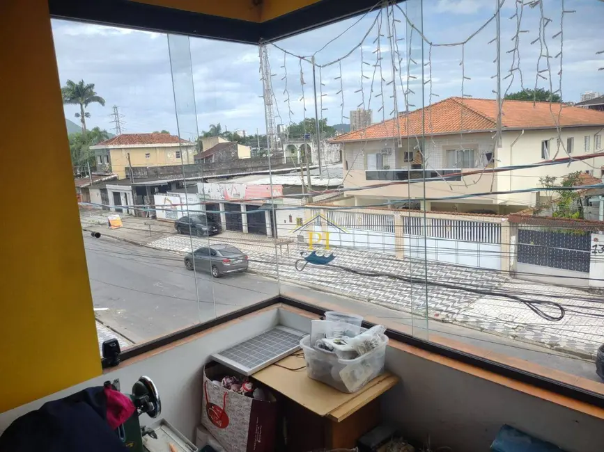 Foto 1 de Sobrado com 3 quartos à venda, 235m2 em Praia Grande - SP