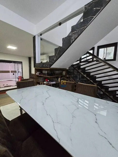 Foto 9 de Casa com 3 quartos à venda e para alugar, 114m2 em Praia Grande - SP