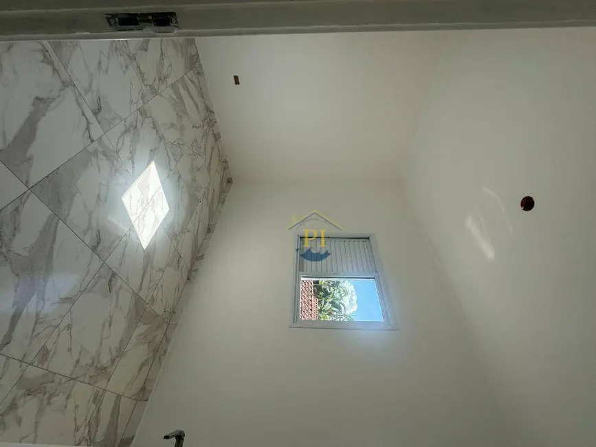Foto 9 de Sobrado com 3 quartos à venda, 110m2 em Praia Grande - SP