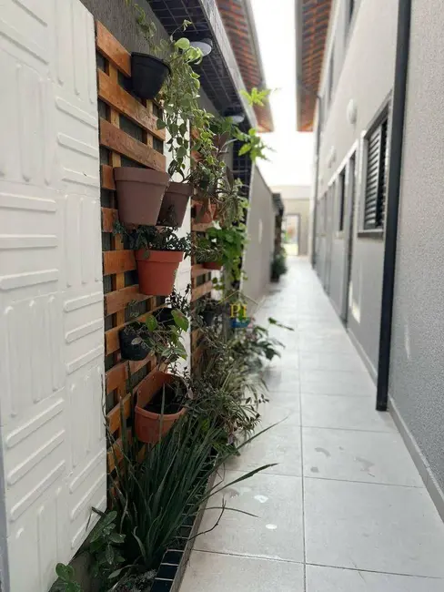 Foto 2 de Casa de Condomínio com 2 quartos à venda, 54m2 em Maracanã, Praia Grande - SP