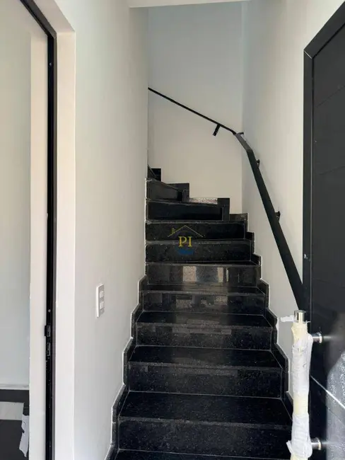 Foto 4 de Sobrado com 3 quartos à venda, 101m2 em Maracanã, Praia Grande - SP