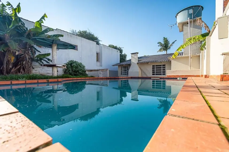 Foto 1 de Casa com 3 quartos à venda, 121m2 em Vila Monte Carlo, Cachoeirinha - RS