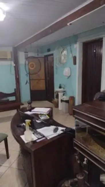 Foto 4 de Casa com 4 quartos à venda, 180m2 em Praia Grande - SP