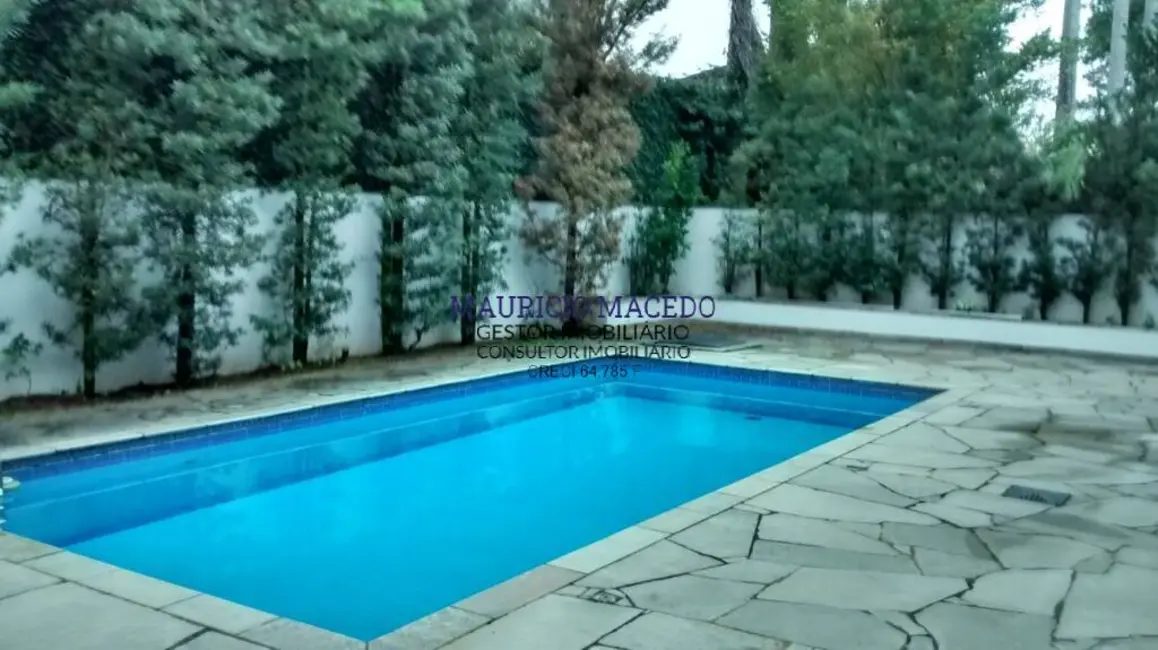 Foto 1 de Casa com 4 quartos para alugar, 560m2 em Alphaville Residencial Dois, Barueri - SP