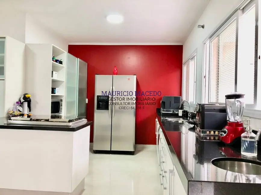 Foto 9 de Casa com 4 quartos à venda, 649m2 em Alphaville Residencial Um, Barueri - SP