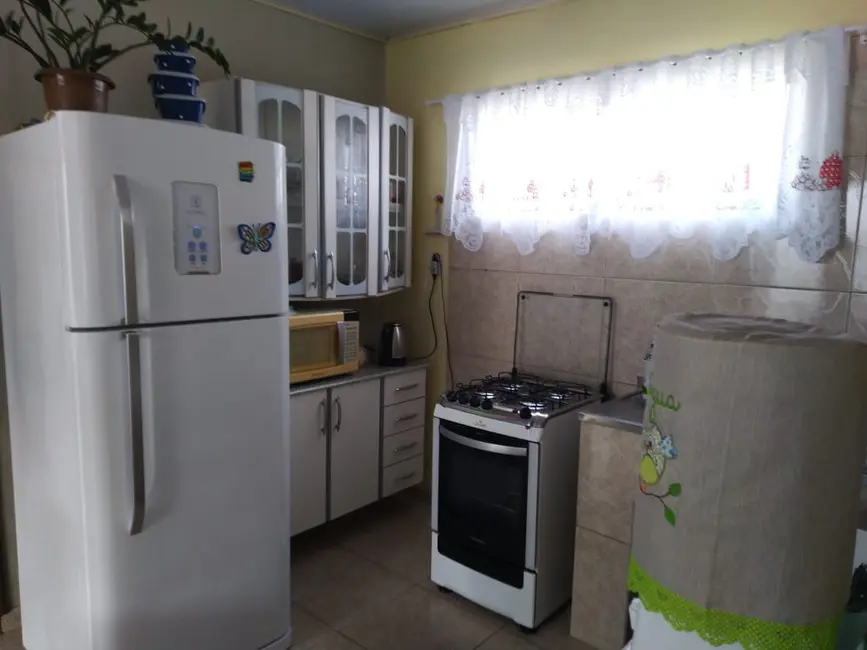 Foto 13 de Casa com 2 quartos à venda, 123m2 em Tramandai - RS